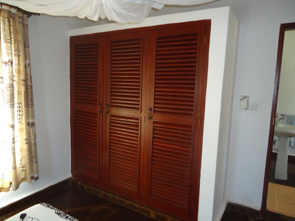 Simba & Oryx Cottages Playa de Diani Habitación foto