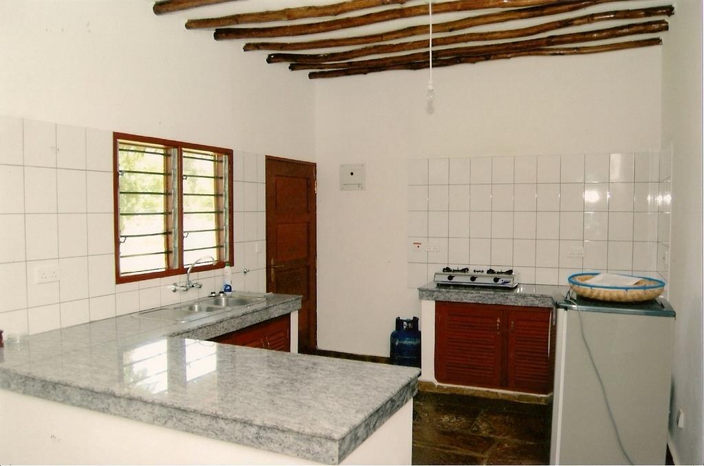 Simba & Oryx Cottages Playa de Diani Habitación foto