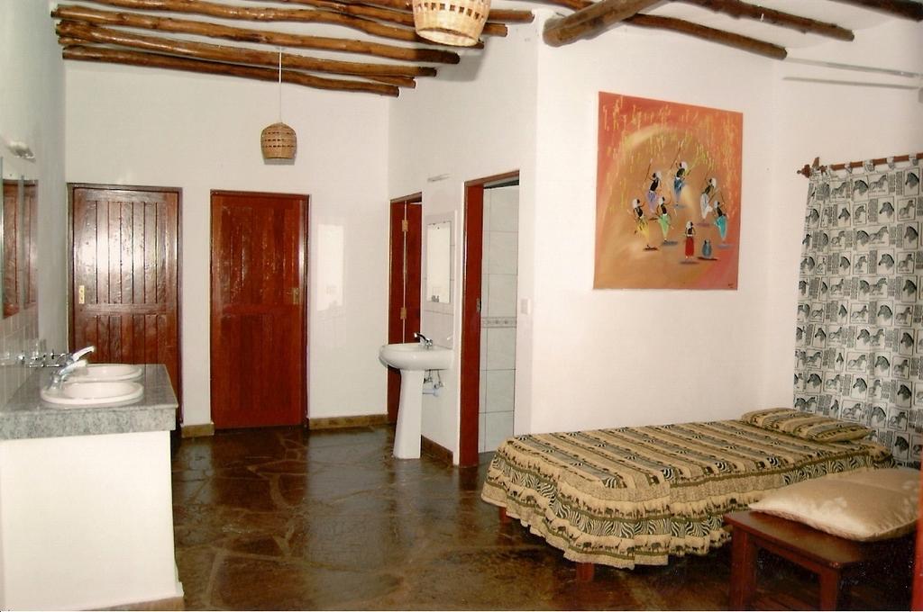 Simba & Oryx Cottages Playa de Diani Habitación foto