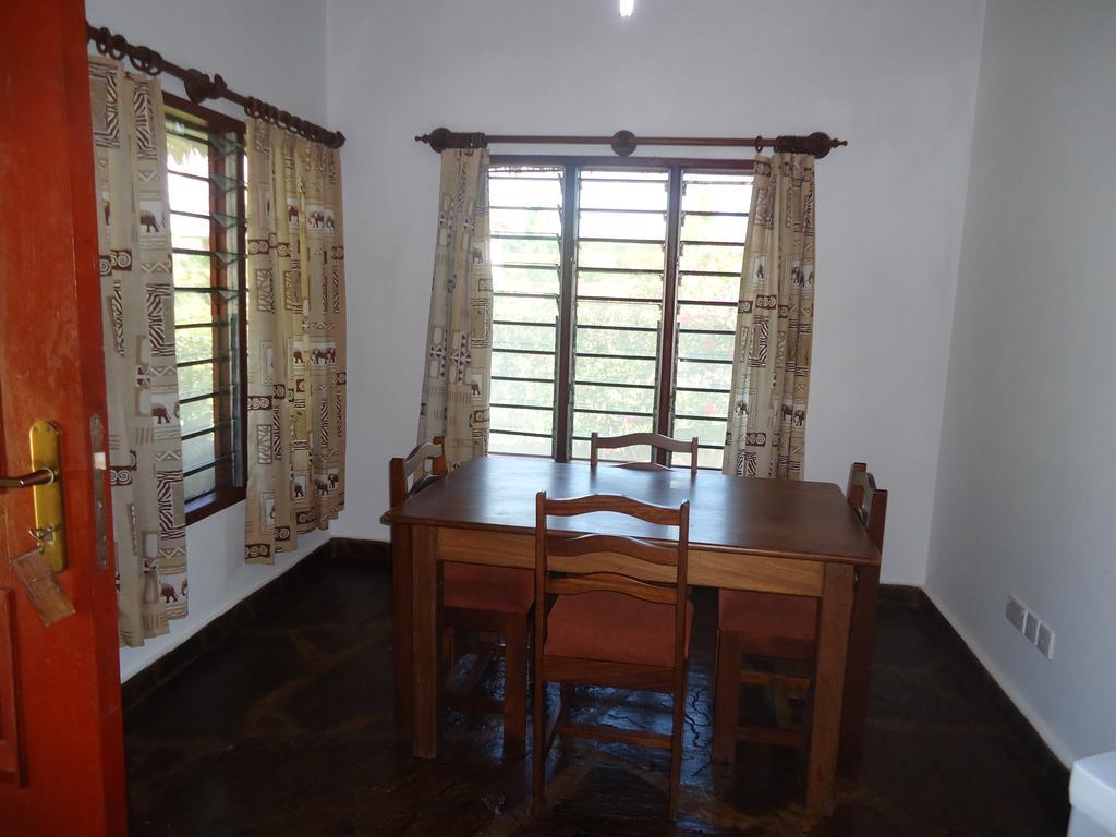 Simba & Oryx Cottages Playa de Diani Habitación foto