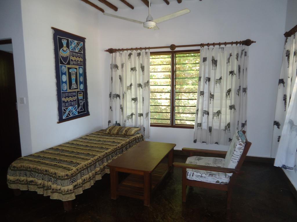 Simba & Oryx Cottages Playa de Diani Habitación foto